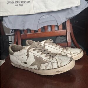 Golden Goose Cream and Gold Super-Star Sneakers